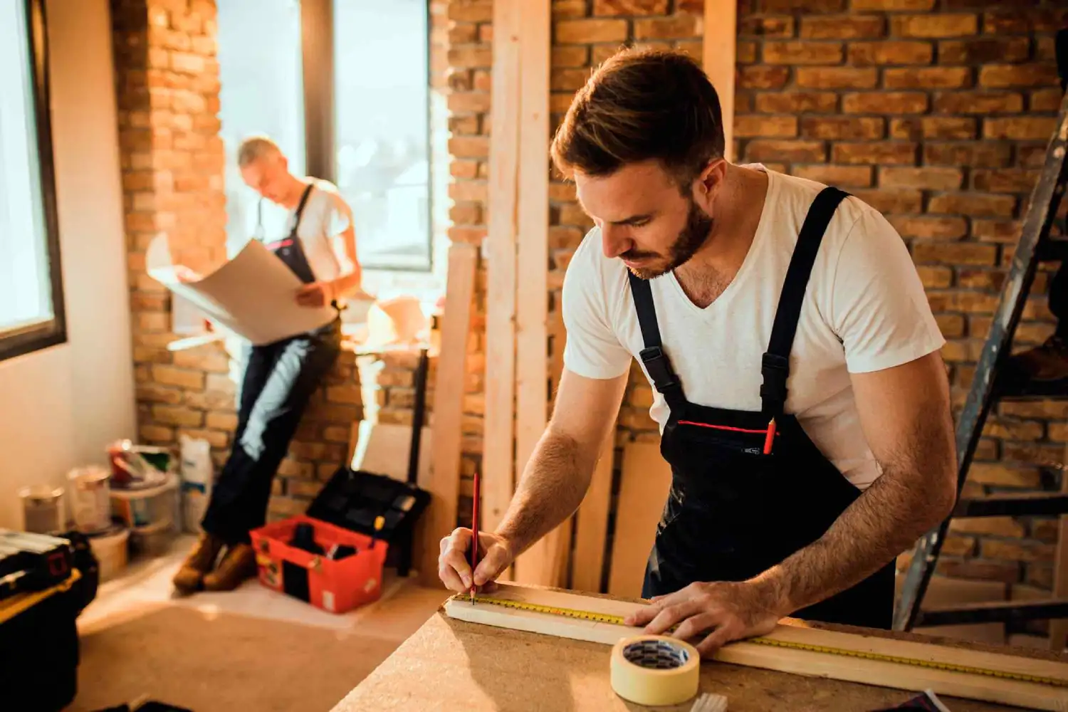 A Professional Handyman Working on a Piece of Wood